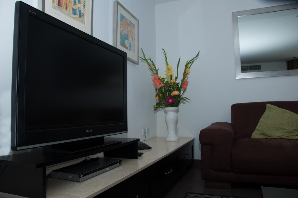 Club Salina Wharf Aparthotel Кавра Стая снимка