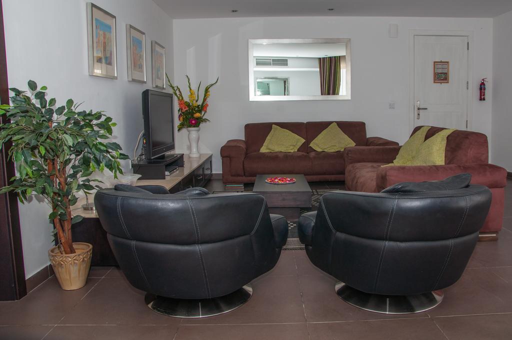Club Salina Wharf Aparthotel Кавра Стая снимка